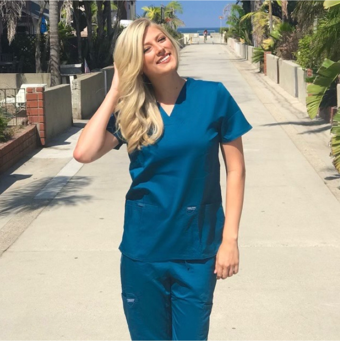 Nurse Kelley wearing Workwear Revolution scrubs